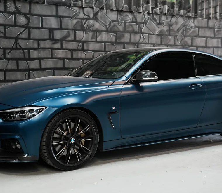 Frozen blue BMW 4 Series coupe finished and ready for collection at System X Car Care, Abu Dhabi.