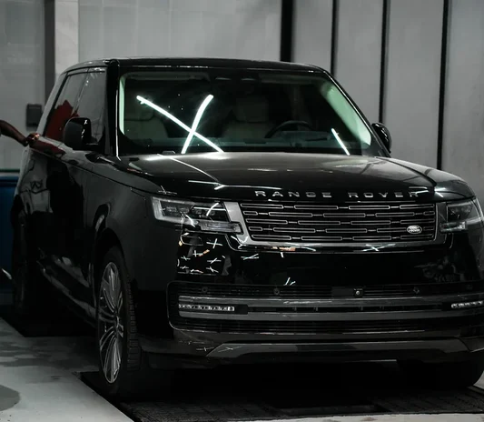 Range Rover prepared for paint work at the System X Car Care workshop in Abu Dhabi