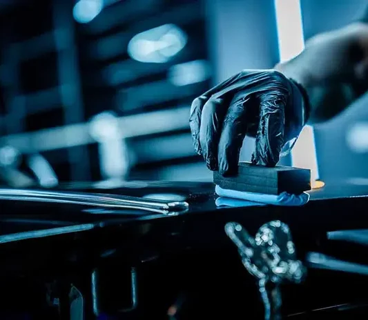 Ceramic coating being applied to a car at the System X Car Care workshop in Al Quoz, Dubai, Abu Dhabi